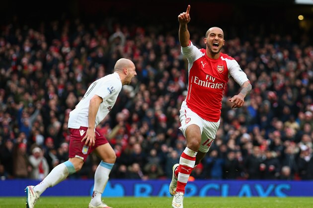 LONDON, ENGLAND - FEBRUARY 01:  Theo Walcott of Arsenal celebrates after scoring his team's third goal during the Barclays Premier League match between Arsenal and Aston Villa at the Emirates Stadium on February 1, 2015 in London, England.  (Photo by Paul Gilham/Getty Images)