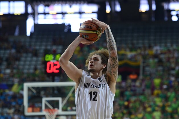 New Zealand's Isaac Fotu shoots the ball against Lithuania during Basketball World Cup Round of 16 match between New Zealand and Lithuania at the Palau Sant Jordi in Barcelona, Spain, Sunday, Sept. 7, 2014. The 2014 Basketball World Cup competition will take place in various cities in Spain from Aug. 30 through to Sept. 14. (AP Photo/Manu Fernandez)
