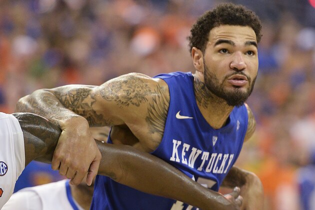 Kentucky forward Willie Cauley-Stein (15) watches for a rebound while held back by a player during the second half of an NCAA college basketball game against Florida in Gainesville, Fla., Saturday, Feb. 7, 2015. Kentucky defeated Florida 68-61. (AP Photo/Phil Sandlin)