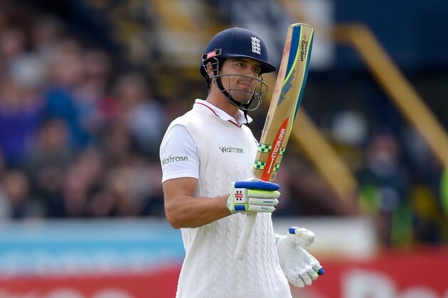 LEEDS, ENGLAND - MAY 30:  England batsman Alastair Cook raises his bat as he becomes the hightest test run scorer for England during day two of the 2nd Investec test match between England and New Zealand at Headingley on May 30, 2015 in Leeds, England.  (Photo by Stu Forster/Getty Images)