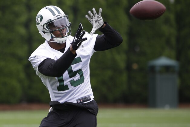 New York Jets' Brandon Marshall catches a pass during an NFL football organized team activity in Florham Park, N.J., Wednesday, May 27, 2015. (AP Photo/Seth Wenig)