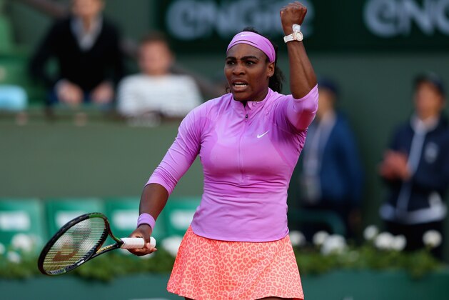 PARIS, FRANCE - MAY 30:  Serena Williams of the United States celebrates match point in her Women's Singles match against Victoria Azarenka of Belarus on day seven of the 2015 French Open at Roland Garros on May 30, 2015 in Paris, France.  (Photo by Clive Brunskill/Getty Images)