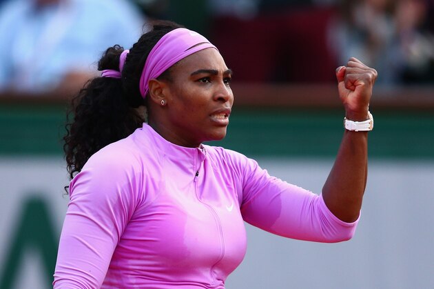 PARIS, FRANCE - MAY 30:  Serena Williams of the United States celebrates match point in her Women's Singles match against Victoria Azarenka of Belarus on day seven of the 2015 French Open at Roland Garros on May 30, 2015 in Paris, France.  (Photo by Clive Mason/Getty Images)