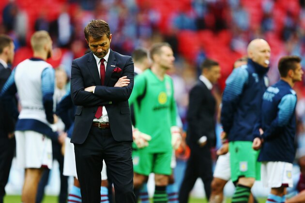 LONDON, ENGLAND - MAY 30:  Tim Sherwood manager of Aston Villa looks dejected in defeat after the FA Cup Final between Aston Villa and Arsenal at Wembley Stadium on May 30, 2015 in London, England. Arsenal beat Aston Villa 4-0.  (Photo by Paul Gilham/Getty Images)
