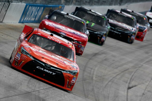 DOVER, DE - MAY 30:  Daniel Suarez, driver of the #18 ARRIS Toyota, leads a pack of cars during the NASCAR XFINITY Series Buckle Up 200 presented by Click It or Ticket at Dover International Speedway on May 30, 2015 in Dover, Delaware.  (Photo by Brian Lawdermilk/Getty Images)