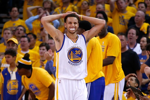 OAKLAND, CA - MAY 27:  Stephen Curry #30 of the Golden State Warriors reacts in the second half while taking on the Houston Rockets during game five of the Western Conference Finals of the 2015 NBA Playoffs at ORACLE Arena on May 27, 2015 in Oakland, California. NOTE TO USER: User expressly acknowledges and agrees that, by downloading and or using this photograph, user is consenting to the terms and conditions of Getty Images License Agreement.  (Photo by Ezra Shaw/Getty Images)