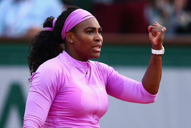 PARIS, FRANCE - MAY 30:  Serena Williams of the United States celebrates match point in her Women's Singles match against Victoria Azarenka of Belarus on day seven of the 2015 French Open at Roland Garros on May 30, 2015 in Paris, France.  (Photo by Clive Mason/Getty Images)