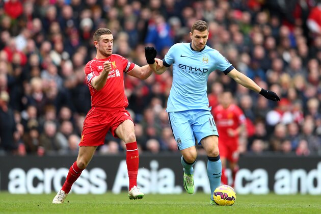 LIVERPOOL, ENGLAND - MARCH 01: Edin Dzeko of Manchester City is closed down by Jordan Henderson of Liverpool during the Barclays Premier League match between Liverpool and Manchester City at Anfield on March 1, 2015 in Liverpool, England. (Photo by Clive Brunskill/Getty Images) LIVERPOOL, ENGLAND - MARCH 01: Edin Dzeko of Manchester City is closed down by Jordan Henderson of Liverpool during the Barclays Premier League match between Liverpool and Manchester City at Anfield on March 1, 2015 in Liverpool, England. (Photo by Clive Brunskill/Getty Images)