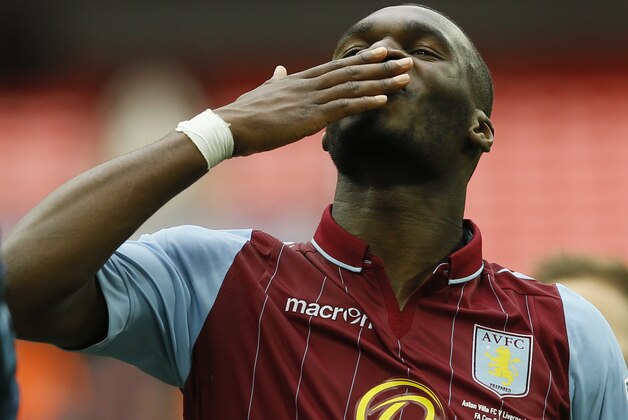 Aston Villa’s Christian Benteke celebrates after the end of the  English FA Cup semifinal soccer match between Liverpool and  Aston Villa at Wembley Stadium in London, Sunday, April 19, 2015. Aston Villa won the game 2-1.(AP Photo/Kirsty Wigglesworth)