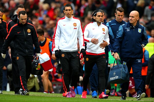 MANCHESTER, ENGLAND - APRIL 04:  Substitutes Angel di Maria of Manchester United and Radamel Falcao of Manchester United walk off the pitch at half-time in the Barclays Premier League match between Manchester United and Aston Villa at Old Trafford on April 4, 2015 in Manchester, England.  (Photo by Alex Livesey/Getty Images)