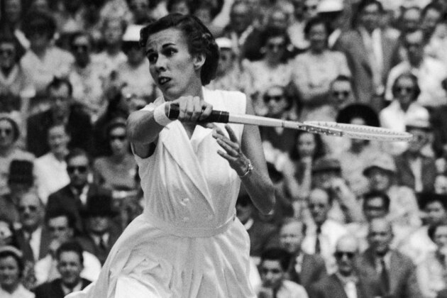 Miss Doris Hart of Coral Gables, Florida, defeated Mrs. Dorothy Head Knode from Alameda, California, 6-2; 6-2 in their semi-finals match on the center court on July 2, 1953 – the tenth day of play in the 67th All-England lawn Tennis Championships at Wimbledon, London, United Kingdom. Miss Doris Hart in play on the center court during the semifinals in Wimbledon, England on July 2, 1953. (AP Photo/Leslie Priest)
