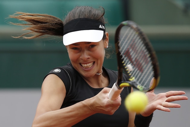 Serbia's Ana Ivanovic returns in the fourth round match of the French Open tennis tournament against Russia's Ekaterina Makarova at the Roland Garros stadium, in Paris, France, Sunday, May 31, 2015. (AP Photo/Michel Euler)