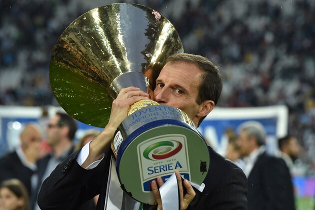 TURIN, ITALY - MAY 23:  Juventus FC head coach Massimiliano Allegri celebrates with the Serie A Trophy at the end of the Serie A match between Juventus FC and SSC Napoli at Juventus Arena on May 23, 2015 in Turin, Italy.  (Photo by Valerio Pennicino/Getty Images)