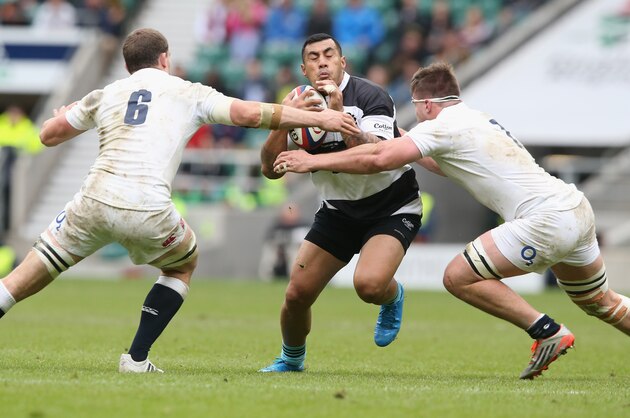 LONDON, ENGLAND - MAY 31:  Tusi Pisi of the Barbarians is tackled by Mark Wilson (L) and Jack Clifford durng the Rugby International match between England and the Barbarians at Twickenham Stadium on May 31, 2015 in London, England.  (Photo by David Rogers/Getty Images)