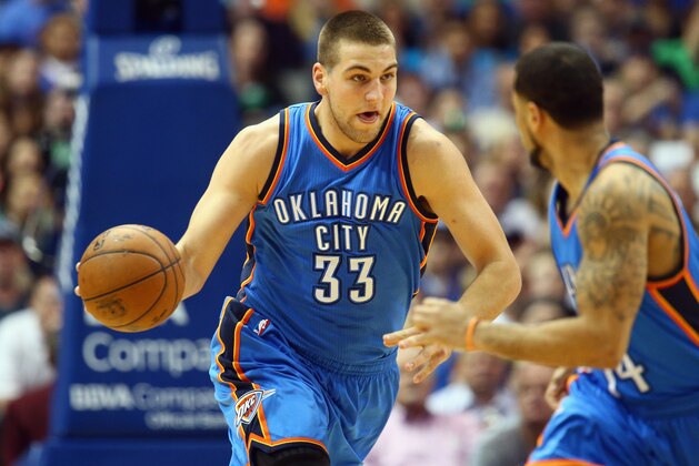 DALLAS, TX - MARCH 16:  Mitch McGary #33 of the Oklahoma City Thunder at American Airlines Center on March 16, 2015 in Dallas, Texas.  NOTE TO USER: User expressly acknowledges and agrees that, by downloading and or using this photograph, User is consenting to the terms and conditions of the Getty Images License Agreement.  (Photo by Ronald Martinez/Getty Images)