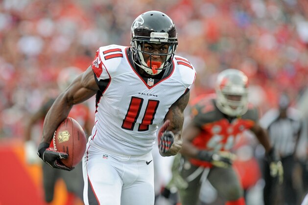 TAMPA, FL - NOVEMBER 09: Julio Jones #11 of the Atlanta Falcons carries during the second quarter of the game against the Tampa Bay Buccaneers at Raymond James Stadium on November 9, 2014 in Tampa, Florida. (Photo by Cliff McBride/Getty Images)