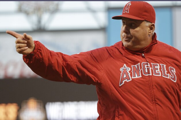 Los Angeles Angels manager Mike Scioscia argues a call with home plate umpire Bill Miller during the third inning of a baseball game against the San Francisco Giants on Friday, May 1, 2015, in San Francisco. (AP Photo/Marcio Jose Sanchez)