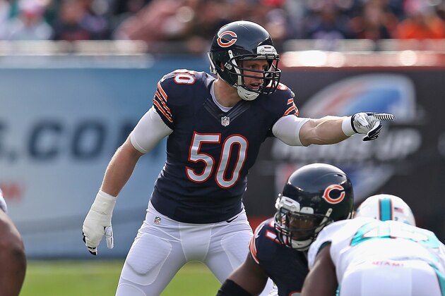 CHICAGO, IL - OCTOBER 19: Shea McClellin #50 of the Chicago Bears calls defensive signals against the Miami Dolphins at Soldier Field on October 19, 2014 in Chicago, Illinois. The Dolphins defeated the Bears 27-14.  (Photo by Jonathan Daniel/Getty Images)