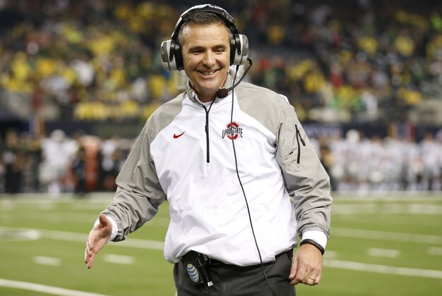 Jan 12, 2015; Arlington, TX, USA; Ohio State Buckeyes head coach Urban Meyer smiles late in the fourth quarter against the Oregon Ducks in the 2015 CFP National Championship Game at AT&T Stadium. Mandatory Credit: Matthew Emmons-USA TODAY Sports