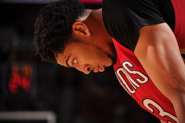 HOUSTON, TX - APRIL 12: Anthony Davis #23 of the New Orleans Pelicans looks on during the game against the Houston Rockets on April 12, 2015 at the Toyota Center in Houston, Texas. NOTE TO USER: User expressly acknowledges and agrees that, by downloading and or using this photograph, User is consenting to the terms and conditions of the Getty Images License Agreement. Mandatory Copyright Notice: Copyright 2015 NBAE (Photo by Bill Baptist/NBAE via Getty Images)