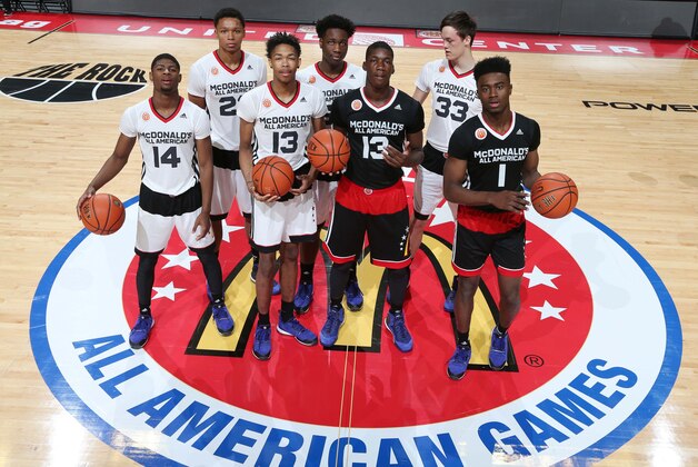Apr 1, 2015; Chicago, IL, USA; McDonalds High School All Americans forward forward Ivan Rabb (23), center Caleb Swanigan (50), guard Malik Newman (14), forward Brandon X. Ingram (13) white jersey, forward Cheick Diallo (13) black jersey, forward Jaylen Brown (1) and center Stephen Zimmerman Jr. (33) who are all still undecided on their choice of college pose for a group photo  before the start of the McDonalds High School All American Games at the United Center. Mandatory Credit: Brian Spurlock-USA TODAY Sports