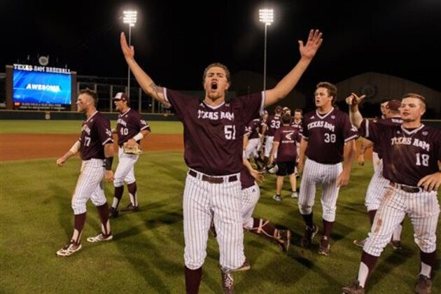 CORRECTS TO SUNDAY - Texas A&M pitcher Tyler Stubblefield (51) celebrates with teammates after Texas A&M defeated California 4-3 in 12 innings during an NCAA college baseball tournament regional game in College Station, Texas, Sunday, May 31, 2015. (AP Photo/Juan DeLeon}