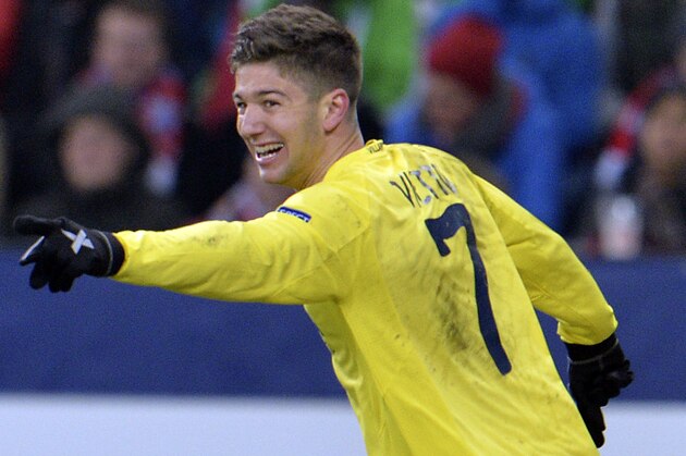 Villareal's Luciano Vietto celebrates after scoring during the Europa League Round 32 soccer match between FC Salzburg and Villareal FC in the Arena in Salzburg, Austria, Thursday, Feb. 26, 2015. (AP Photo/Kerstin Joensson)