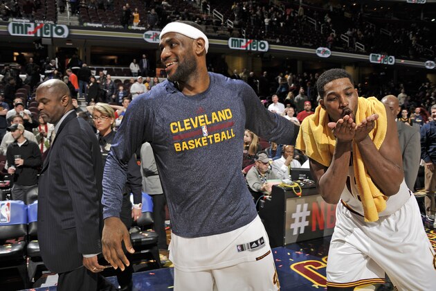 CLEVELAND, OH - FEBRUARY 11:  LeBron James #23 and Tristan Thompson #13 of the Cleveland Cavaliers celebrate a victory against the Miami Heat on February 11, 2015 at Quicken Loans Arena in Cleveland, Ohio. NOTE TO USER: User expressly acknowledges and agrees that, by downloading and/or using this Photograph, user is consenting to the terms and conditions of the Getty Images License Agreement. Mandatory Copyright Notice: Copyright 2015 NBAE (Photo by David Liam Kyle/NBAE via Getty Images)