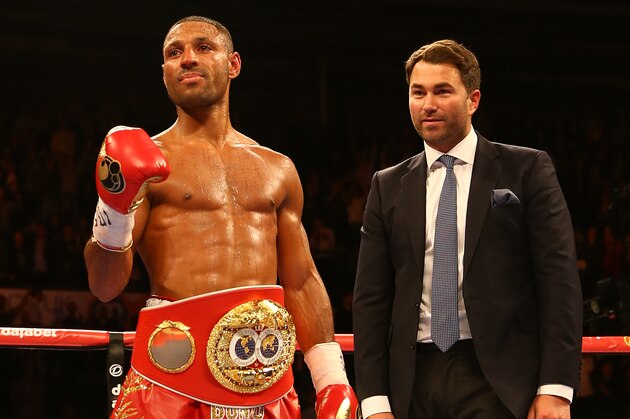 SHEFFIELD, ENGLAND - MARCH 28:  Kell Brook celebrates with promoter Eddie Hearn after beating Jo Jo Dan during their IBF World Welterweight Title Fight at the Motorpoint Arena on March 28, 2015 in Sheffield, England.  (Photo by Richard Heathcote/Getty Images)