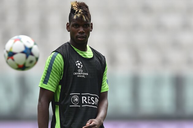 TURIN, ITALY - JUNE 01:  Paul Pogba of Juventus FC looks on during the Juventus Media Day at Juventus Arena on June 1, 2015 in Turin, Italy.  (Photo by Valerio Pennicino/Getty Images)