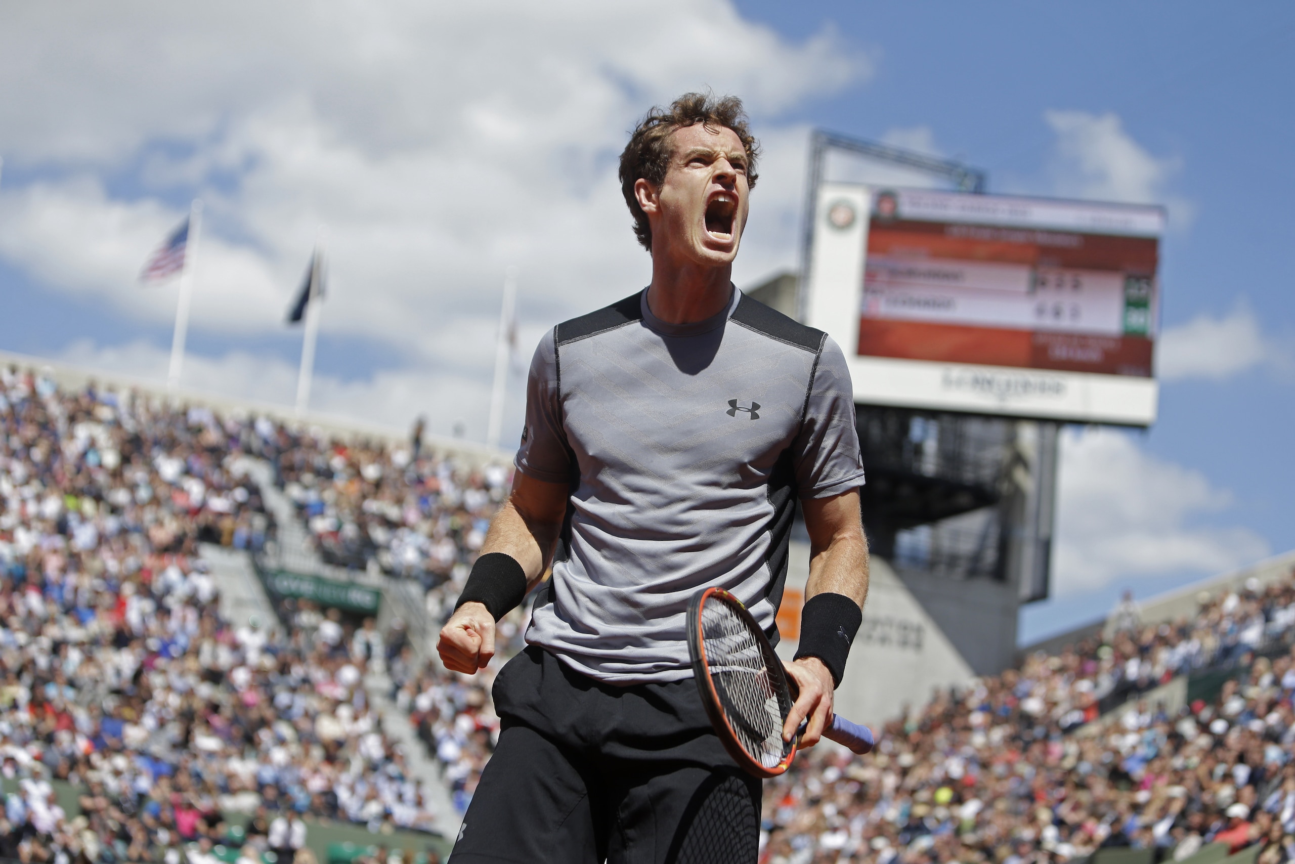 Britain's Andy Murray clenches his fist after scoring a point in the fourth round match of the French Open tennis tournament against France's Jeremy Chardy at the Roland Garros stadium, in Paris, France, Monday, June 1, 2015. (AP Photo/Thibault Camus)