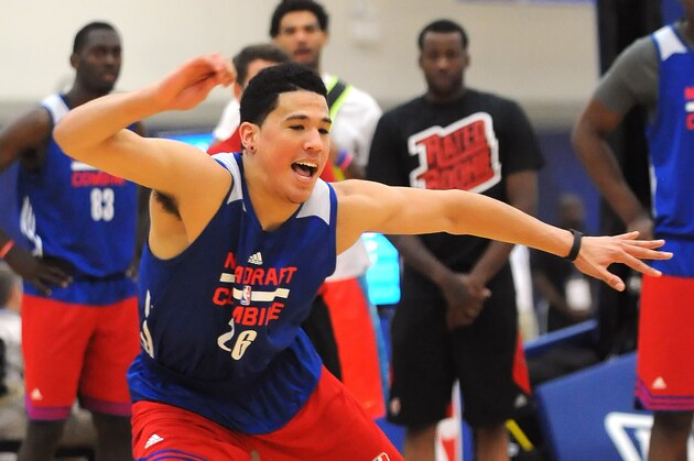 CHICAGO, IL - MAY 15:  Devin Booker #26 completes an agility drill during the 2015 NBA Draft Combine on May 15, 2015 at Quest Multiplex in Chicago, Illinois. NOTE TO USER: User expressly acknowledges and agrees that, by downloading and/or using this photograph, user is consenting to the terms and conditions of the Getty Images License Agreement.  Mandatory Copyright Notice: Copyright 2013 NBAE (Photo by Randy Belice/NBAE via Getty Images)