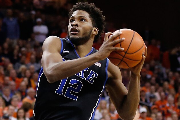 Jan 31, 2015; Charlottesville, VA, USA; Duke Blue Devils forward Justise Winslow (12) drives to the basket against the Virginia Cavaliers at John Paul Jones Arena. Mandatory Credit: Geoff Burke-USA TODAY Sports