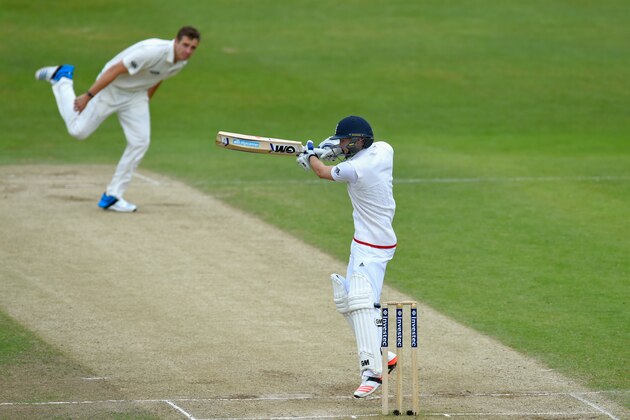 LEEDS, ENGLAND - JUNE 01:  England batsman Adam Lyth cuts a ball to the boundary as New Zealand bowler Tim Southee looks on during day three of the 2nd Investec test match between England and New Zealand at Headingley on June 1, 2015 in Leeds, England.  (Photo by Stu Forster/Getty Images)