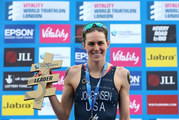 LONDON, ENGLAND - MAY 31:  Elite Women's winner Gwen Jorgensen of USA celebrates with with the leaders trophy during the Threadneedle World Triathlon London race on May 31, 2015 in London, England.  (Photo by Jan Kruger/Getty Images for Threadneedle)