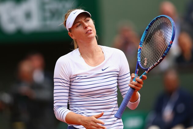PARIS, FRANCE - JUNE 01: Maria Sharapova of Russia reacts in her Women's Singles match against Lucie Safarova of Czech Repbulic on day nine of the 2015 French Open at Roland Garros on June 1, 2015 in Paris, France. (Photo by Clive Brunskill/Getty Images) PARIS, FRANCE - JUNE 01: Maria Sharapova of Russia reacts in her Women's Singles match against Lucie Safarova of Czech Repbulic on day nine of the 2015 French Open at Roland Garros on June 1, 2015 in Paris, France. (Photo by Clive Brunskill/Getty Images)