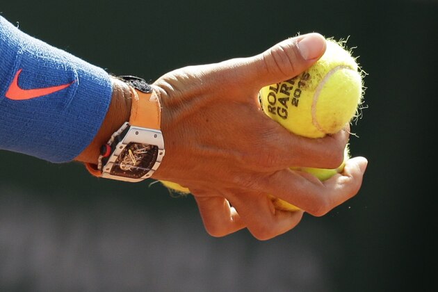 Spain's Rafael Nadal prepares to serve in the fourth round match of the French Open tennis tournament against Jack Sock of the U.S. at the Roland Garros stadium, in Paris, France, Monday, June 1, 2015. (AP Photo/Thibault Camus)