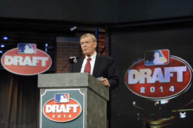 Baseball Commissioner Bud Selig announces the selections during the baseball draft Thursday, June 5, 2014, in Secaucus, N.J. (AP Photo/Bill Kostroun)