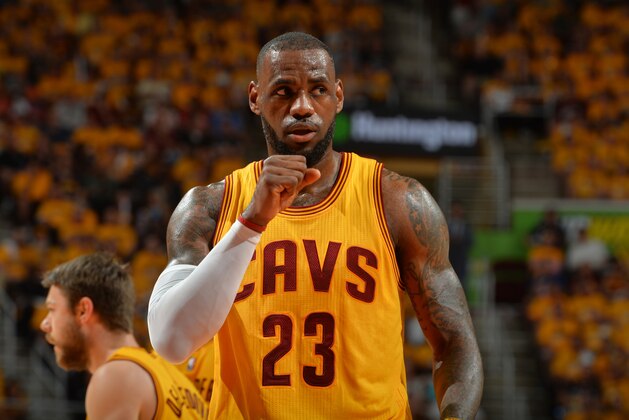 CLEVELAND,OH - MAY 26:  LeBron James #23 of the Cleveland Cavaliers looks on against the Atlanta Hawks at the Quicken Loans Arena During Game Four of the Eastern Conference Finals during the 2015 NBA Playoffs on May 26, 2015 in Cleveland,Ohio NOTE TO USER: User expressly acknowledges and agrees that, by downloading and/or using this Photograph, user is consenting to the terms and conditions of the Getty Images License Agreement. Mandatory Copyright Notice: Copyright 2015 NBAE (Photo by Jesse D. Garrabrant/NBAE via Getty Images)