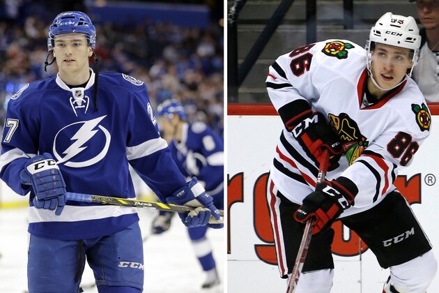 ADVANCE FOR WEEKEND EDITIONS, MAY 15-17 - FILE - At left, in a Dec. 29, 2014, file photo, Tampa Bay Lightning left wing Jonathan Drouin (27) skates before an NHL hockey game against the Toronto Maple Leafs in Tampa, Fla. At right, in an April 11, 2015, file photo, Chicago Blackhawks left wing Teuvo Teravainen skates against the Colorado Avalanche during the first period of an NHL hockey game n Denver. Eight of Anaheim's best players are 24 or younger, and Tampa Bay has the youngest remaining player in the NHL playoffs in 20-year-old winger Jonathan Drouin. The Blackhawks counter with 20-year-old forward Teuvo Teravainen (AP Photo/File) ADVANCE FOR WEEKEND EDITIONS, MAY 15-17 - FILE - At left, in a Dec. 29, 2014, file photo, Tampa Bay Lightning left wing Jonathan Drouin (27) skates before an NHL hockey game against the Toronto Maple Leafs in Tampa, Fla. At right, in an April 11, 2015, file photo, Chicago Blackhawks left wing Teuvo Teravainen skates against the Colorado Avalanche during the first period of an NHL hockey game n Denver. Eight of Anaheim's best players are 24 or younger, and Tampa Bay has the youngest remaining player in the NHL playoffs in 20-year-old winger Jonathan Drouin. The Blackhawks counter with 20-year-old forward Teuvo Teravainen (AP Photo/File)