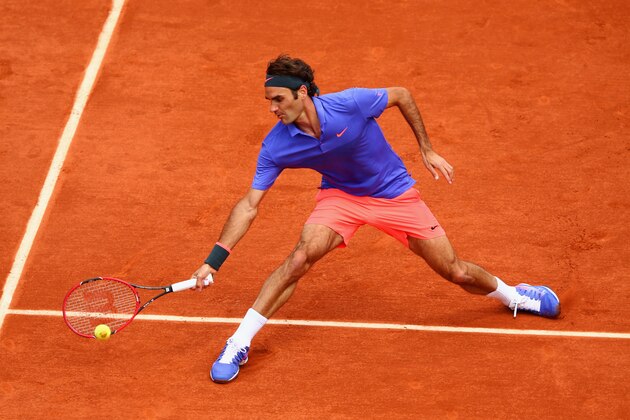 PARIS, FRANCE - JUNE 01:  Roger Federer of Switzerland plays a forehand in his Men's Singles match against Gael Monfils of France on day nine of the 2015 French Open at Roland Garros on June 1, 2015 in Paris, France.  (Photo by Clive Brunskill/Getty Images)