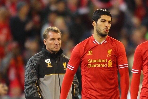 MELBOURNE, AUSTRALIA - JULY 24:  Liverpool FC Manager Brendan Rodgers (L) looks on as Luis Suarez of Liverpool is substituted into the match during the match between the Melbourne Victory and Liverpool at the Melbourne Cricket Ground on July 24, 2013 in Melbourne, Australia.  (Photo by Scott Barbour/Getty Images)