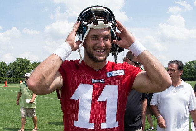 May 28, 2015; Philadelphia, PA, USA; Philadelphia Eagles quarterback Tim Tebow (11) walks off the field after OTA's at the NovaCare Complex. Mandatory Credit: Bill Streicher-USA TODAY Sports