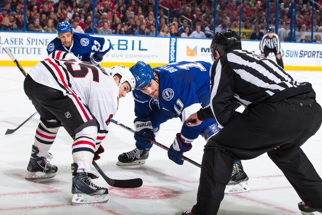 TAMPA, FL - FEBRUARY 27:  Brian Boyle #11 of the Tampa Bay Lightning faces off against Andrew Shaw #65 of the Chicago Blackhawks during the first period at the Amalie Arena on February 27, 2015 in Tampa, Florida.  (Photo by Scott Audette/NHLI via Getty Images)