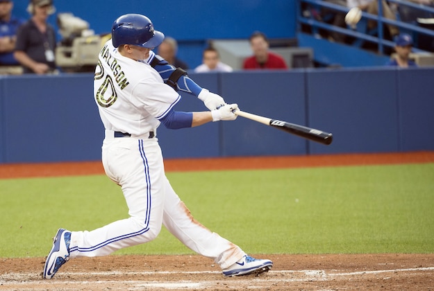 May 25, 2015; Toronto, Ontario, CAN; Toronto Blue Jays third baseman Josh Donaldson (20) hits a ball  during the fifth inning in a game against the Chicago White Sox at Rogers Centre. The Toronto Blue Jays won 6-0. Mandatory Credit: Nick Turchiaro-USA TODAY Sports