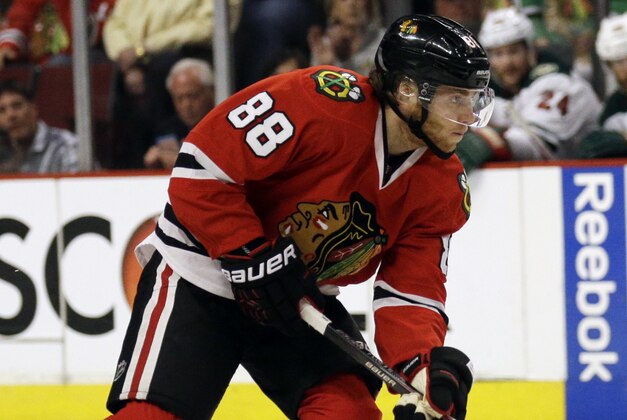 Chicago Blackhawks right wing Patrick Kane controls the puck during the second period  of Game 2 in the second round of the NHL Stanley Cup hockey playoffs against the Minnesota Wild in Chicago, Sunday, May 3, 2015. (AP Photo/Nam Y. Huh)