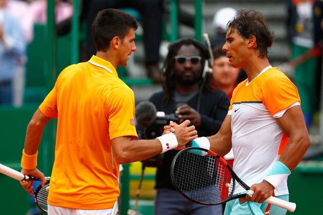 MONTE-CARLO, MONACO - APRIL 18:  Novak Djokovic of Serbia is congratulated by Rafaerl Nadal of Spain in the semi finals during day seven of the Monte Carlo Rolex Masters tennis at the Monte-Carlo Sporting Club on April 18, 2015 in Monte-Carlo, Monaco.  (Photo by Julian Finney/Getty Images)