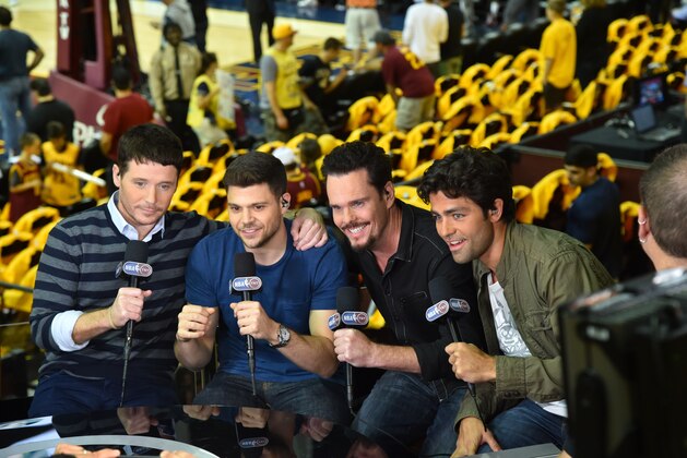 CLEVELAND,OH - MAY 26:  Cast Members from the new movie Entourage, speak with TNT color commentators during the Cleveland Cavaliers against the Atlanta Hawks at the Quicken Loans Arena During Game Four of the Eastern Conference Finals during the 2015 NBA Playoffs on May 26, 2015 in Cleveland,Ohio NOTE TO USER: User expressly acknowledges and agrees that, by downloading and/or using this Photograph, user is consenting to the terms and conditions of the Getty Images License Agreement. Mandatory Copyright Notice: Copyright 2015 NBAE (Photo by Jesse D. Garrabrant/NBAE via Getty Images)