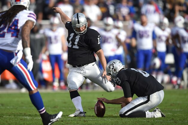OAKLAND, CA - DECEMBER 21:  Sebastian Janikowski #11 of the Oakland Raiders scores a field goal in the second quarter against the Buffalo Bills at O.co Coliseum on December 21, 2014 in Oakland, California.  (Photo by Thearon W. Henderson/Getty Images)