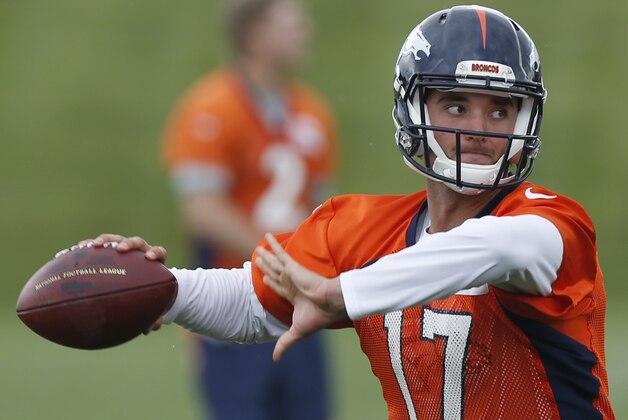 Denver Broncos backup quarterback Brock Osweiler takes part in a passing drill at the conclusion of an organized training activity at the NFL football team's headquarters in Englewood, Colo., Monday, June 1, 2015. (AP Photo/David Zalubowski) Denver Broncos backup quarterback Brock Osweiler takes part in a passing drill at the conclusion of an organized training activity at the NFL football team's headquarters in Englewood, Colo., Monday, June 1, 2015. (AP Photo/David Zalubowski)